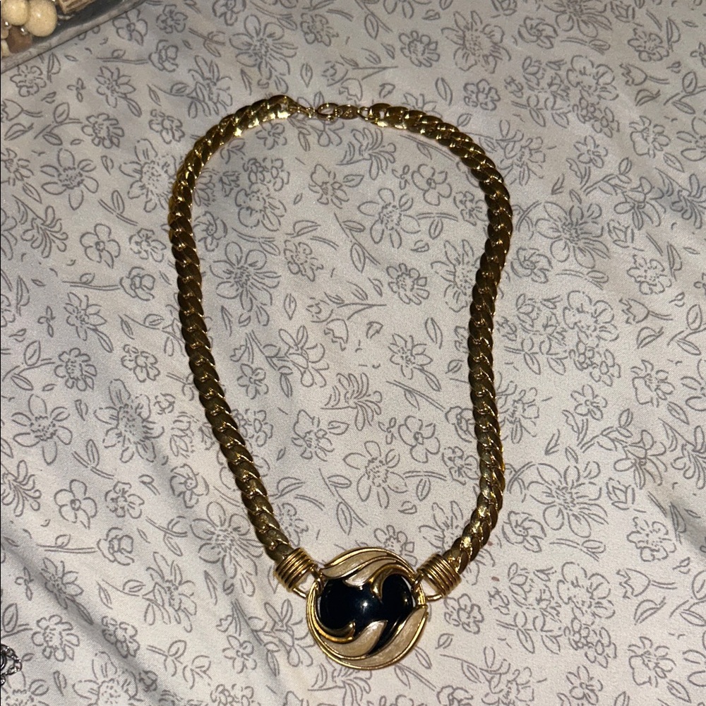 Elegant Gold and Black Necklace